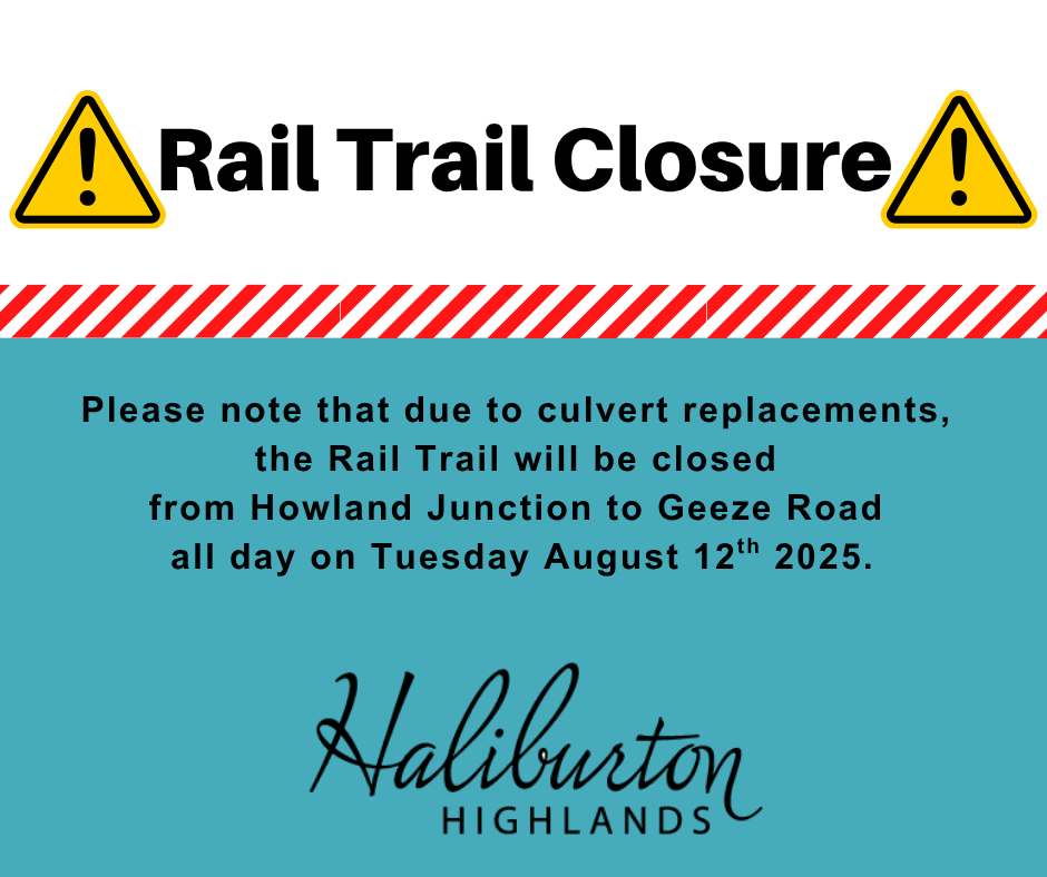 yellow caution signs with the text Rail Trail Closure