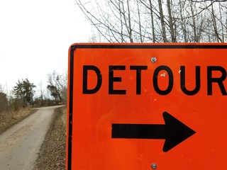 Trail and detour sign