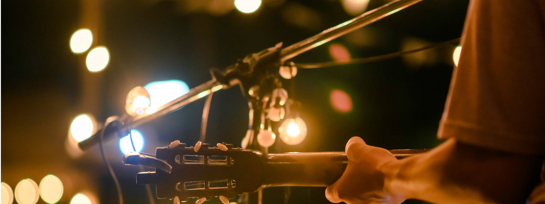 picture of someone playing guitar