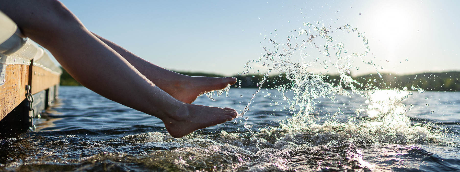 person sitting on a dock