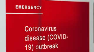 a red covid-19 emergency sign