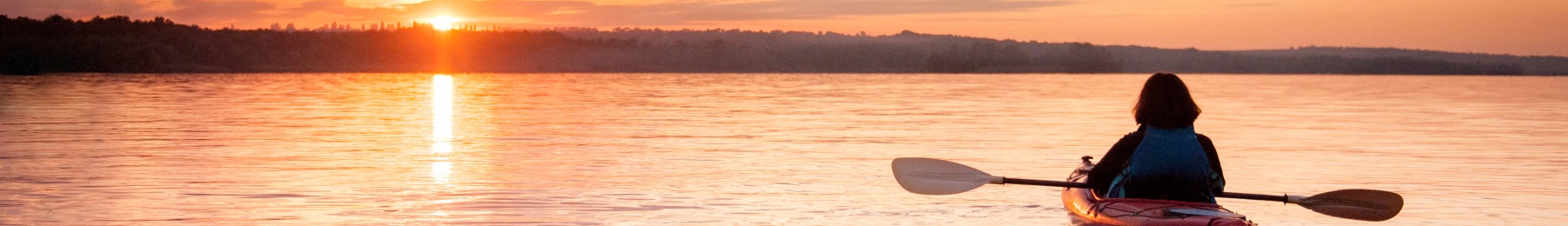 woman kayaking in a lake